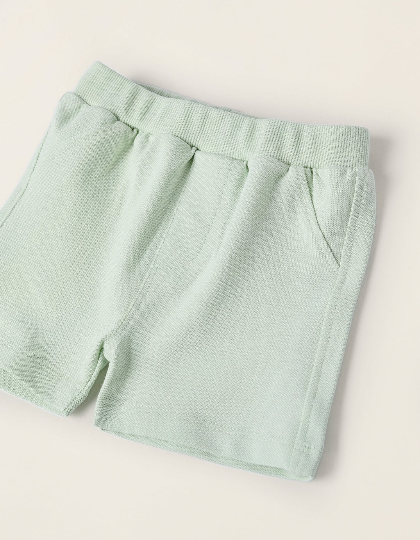 Bodysuit with Motif + Piqué Shorts for Newborns, White/Green