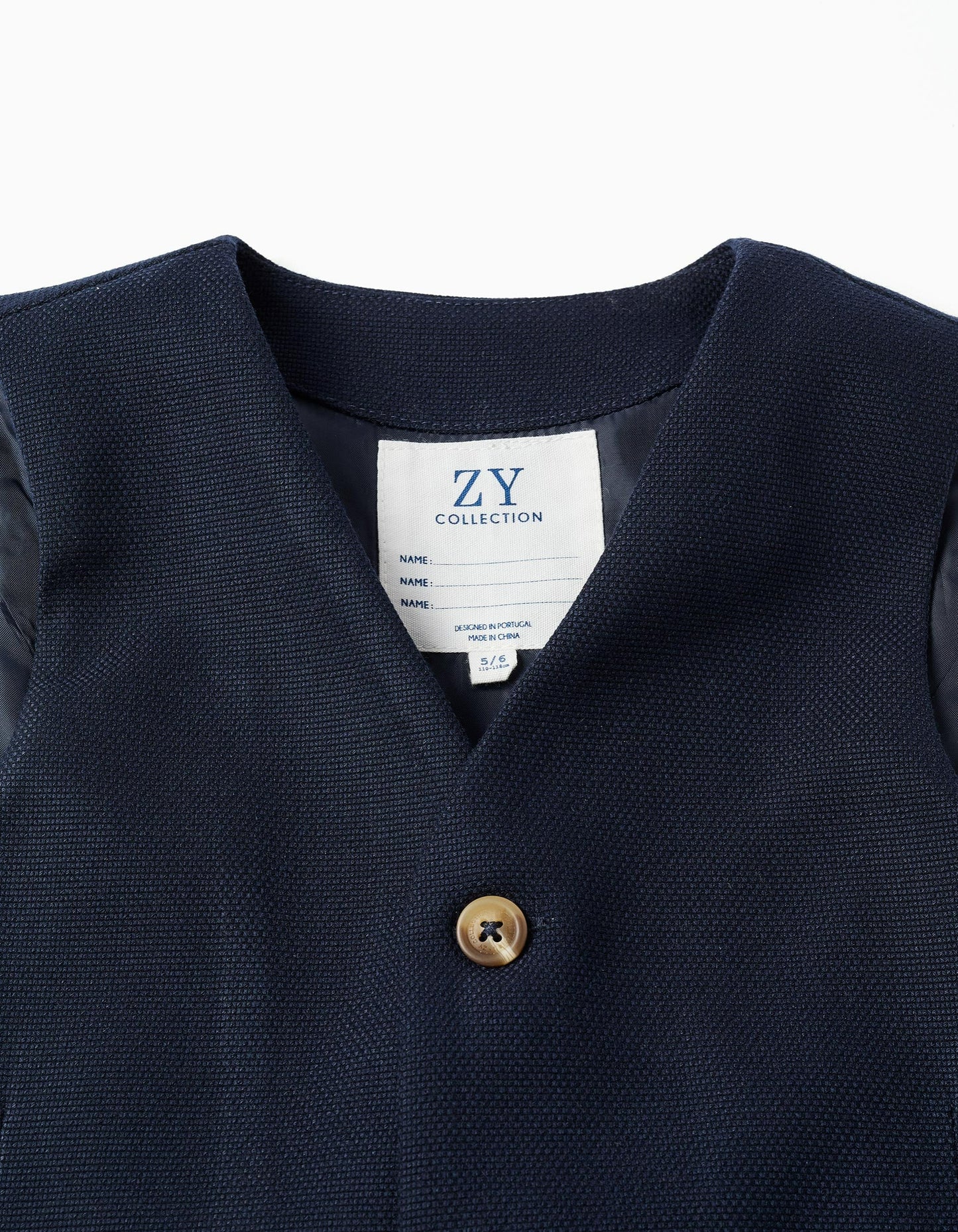 Piqué waistcoat with decorative pockets for boys, dark blue